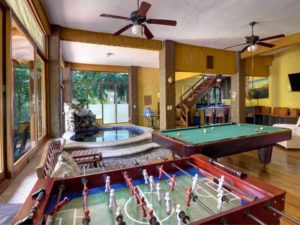 Memorable times are common in the game room playing pool or foosball and relaxing in the splash pool.