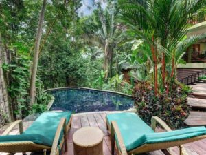 The Manuel Antonio rain forest reaches all the way from the mountains to the beach and makes for a lush green setting for the villa.