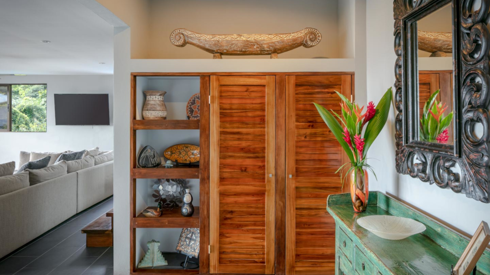 An extra closet and beautiful accessories greet you at the entrance to this villa rental in Manuel Antonio.