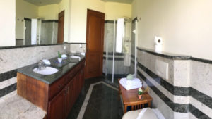 The bathroom is more than large enough for you and your family to get ready in the moring.