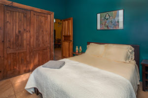 The air conditioned guest bedrooms feature queen-size beds and large closets