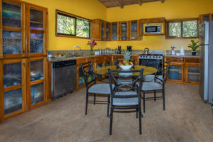 The kitchen is large and has extra dining space as well